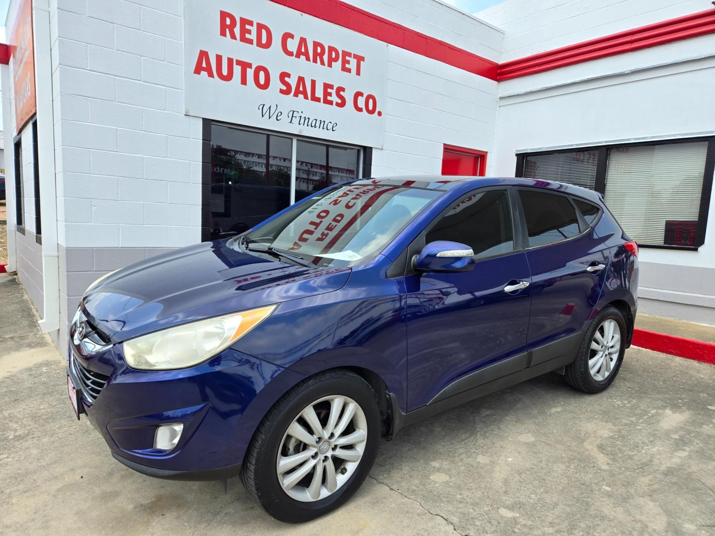 2013 Blue Hyundai Tucson Limited 2WD (KM8JU3AC4DU) with an 2.4L L4 DOHC 16V engine, 6-Speed Automatic transmission, located at 503 West Court, Seguin, TX, 78155, (830) 379-3373, 29.568621, -97.969803 - Photo#0